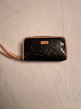 Consuela Black Holographic Star Wristlet with Tan Trim
